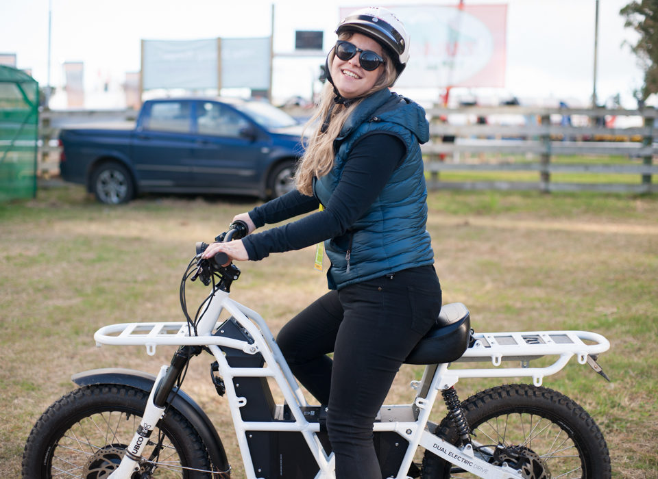 Krissi on an Ubco at Fieldays